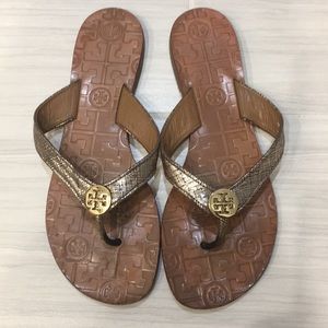 Tory Burch gold flip flop